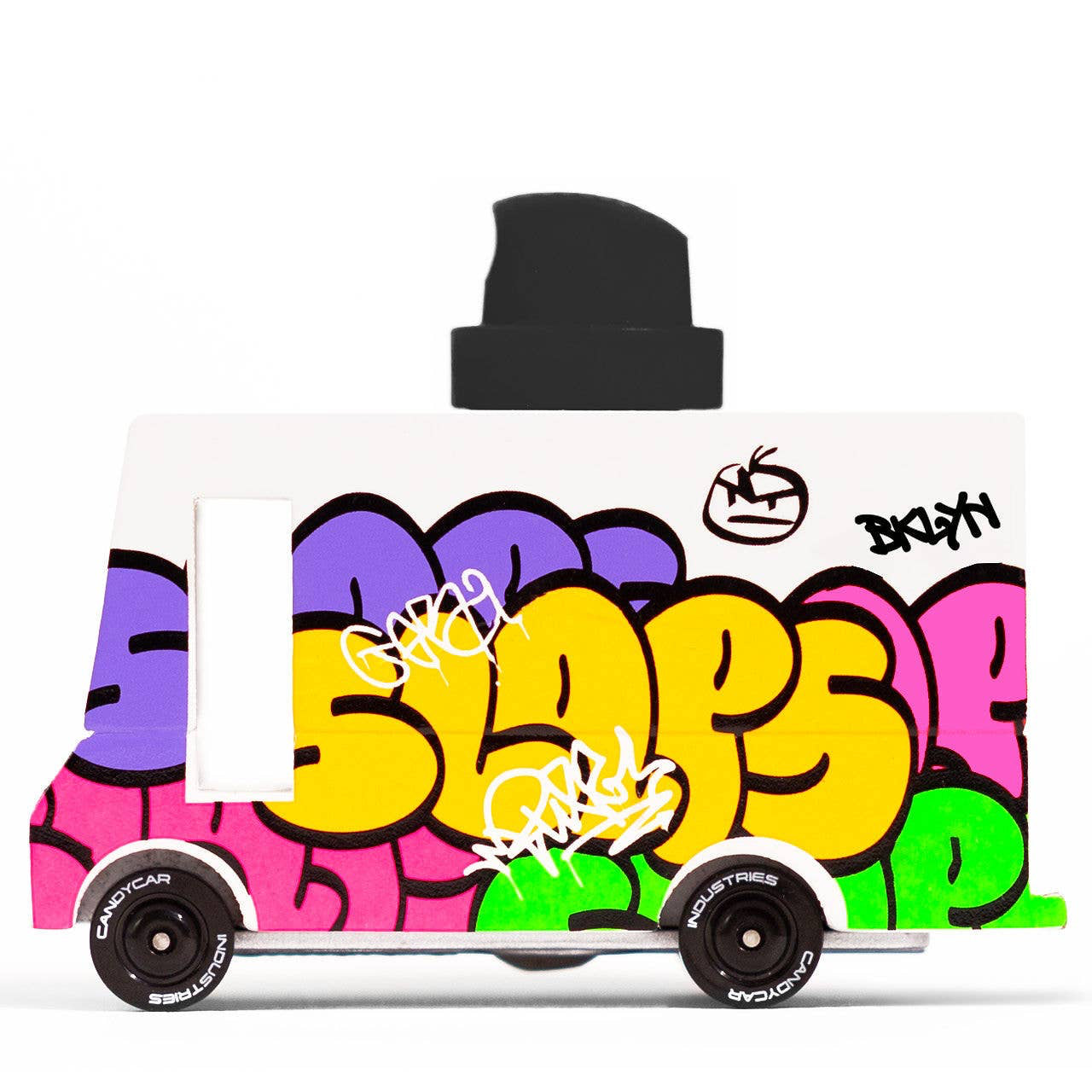 A wooden toy vehicle with a black silicone spray topper, featuring colorful spray paint lettering and designs.