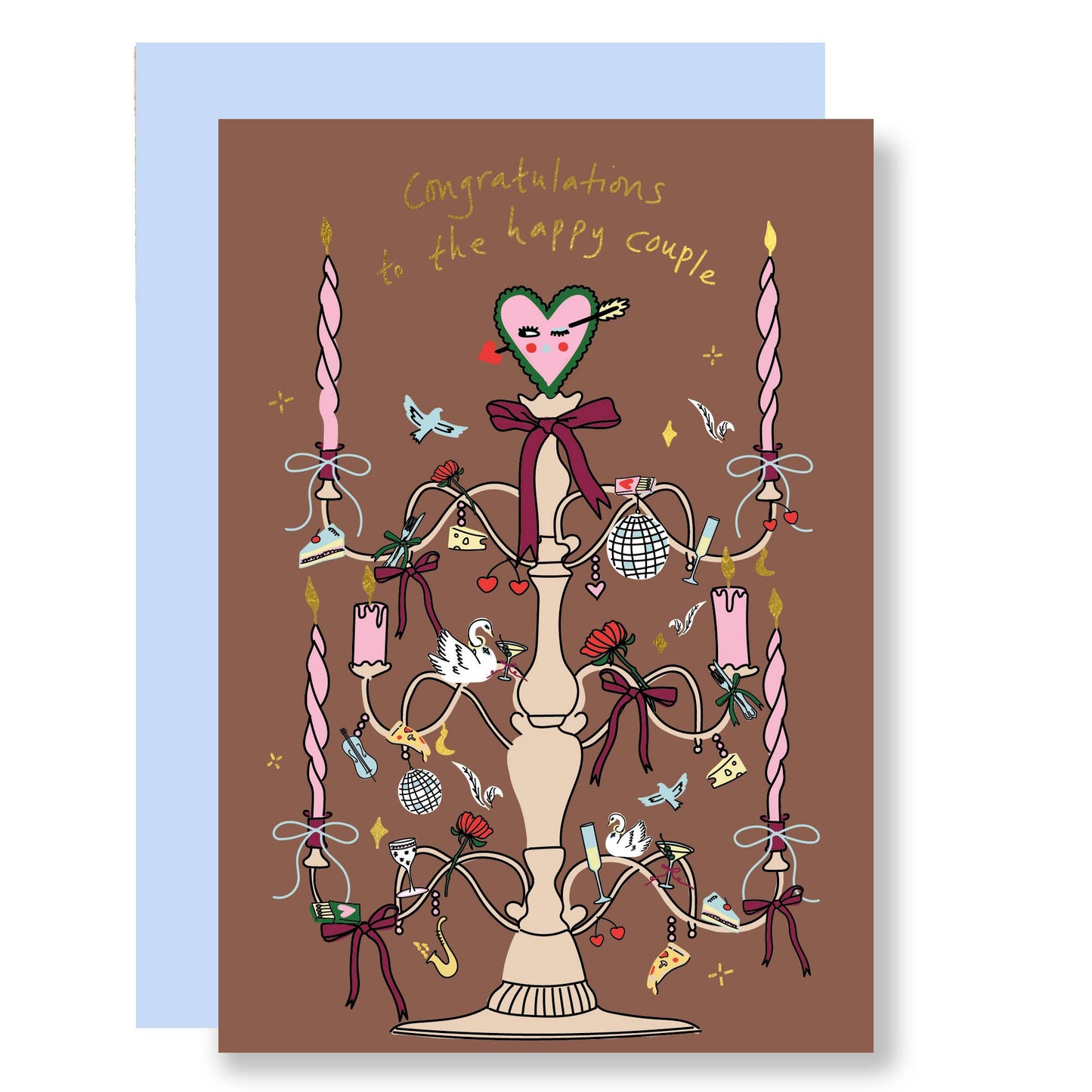 A greeting card with an illustration of a wedding candelabra, featuring candles, birds, and decorative elements, with a gold foil finish. The card has a brown background and includes a blue envelope.