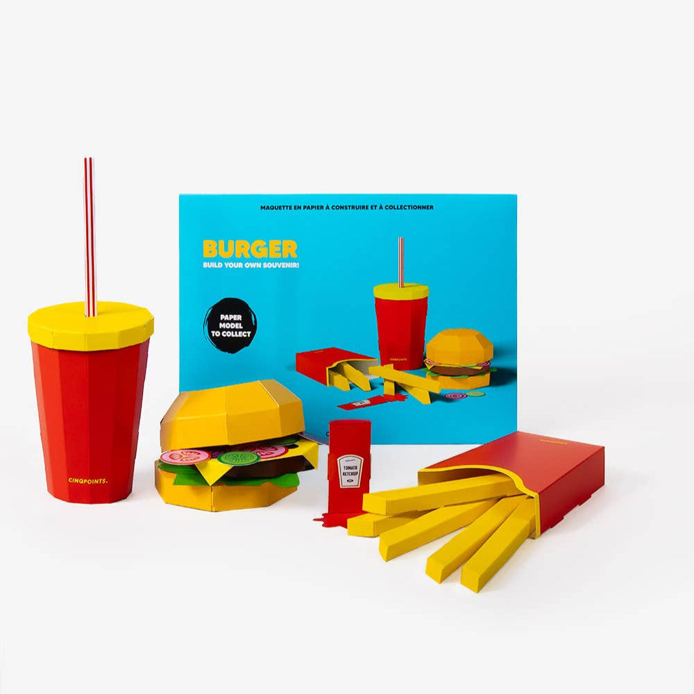 Colorful toy set including a burger, fries, and drinks on a white background