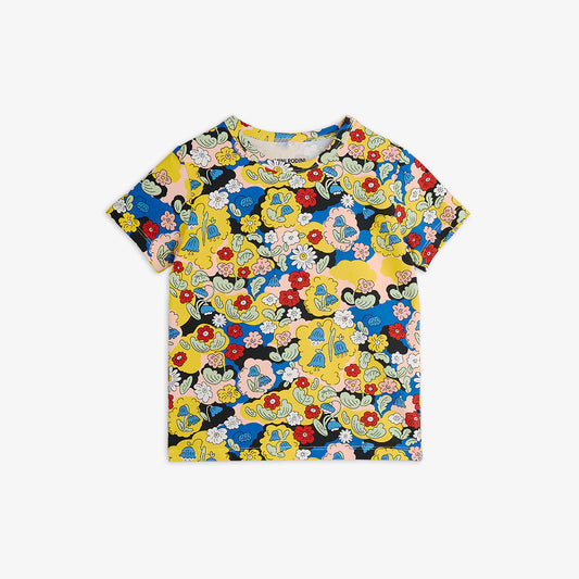 Colorful floral-patterned t-shirt on a white background
