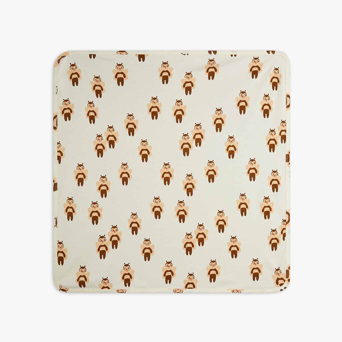 Patterned fabric with bee design on a beige background