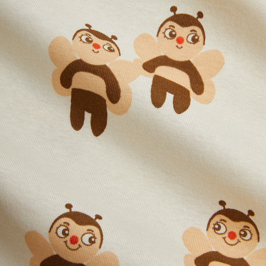Pattern of cartoon bee characters on a beige background