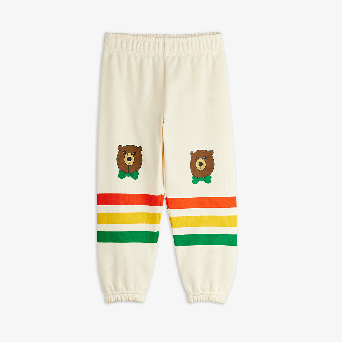 Cream-colored sweatpants with bear illustrations and colorful stripes on a white background