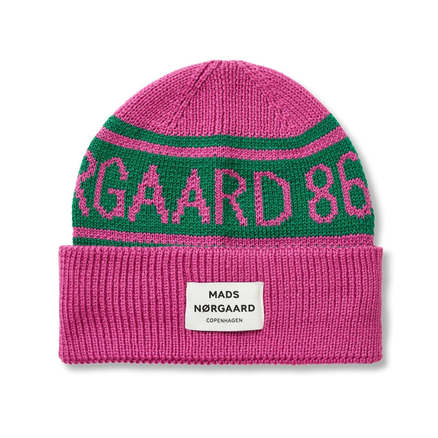 Pink and green beanie with 'Mads Nørgaard 86' branding on a white background