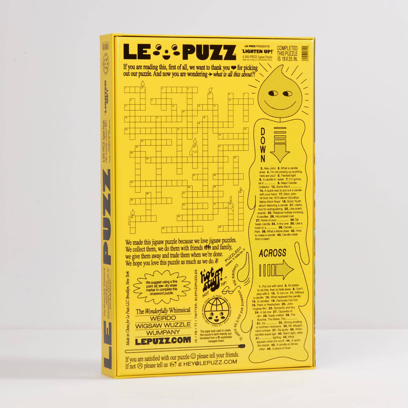 Yellow puzzle box with a crossword-style design on a white background