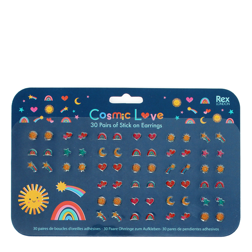 A set of stick on earrings for children with various shapes including hearts, stars, and rainbows presented on a blue card with the title 'Cosmic Love' at the top.