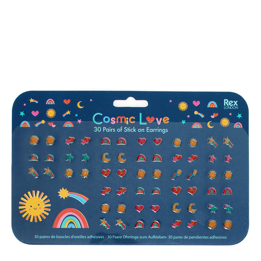 A set of stick on earrings for children with various shapes including hearts, stars, and rainbows presented on a blue card with the title 'Cosmic Love' at the top.