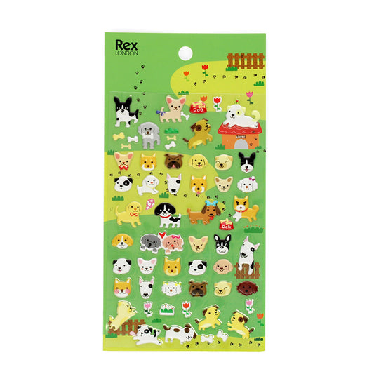 A sheet of 3D puffy stickers featuring various cute dog illustrations in multicolor on a green background.