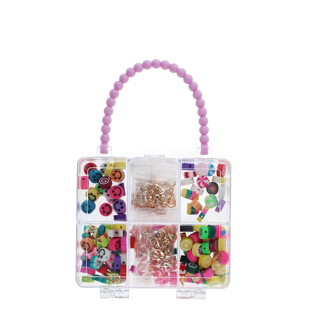 Colorful jewelry-making kit with beads and charms in a clear plastic case on a white background