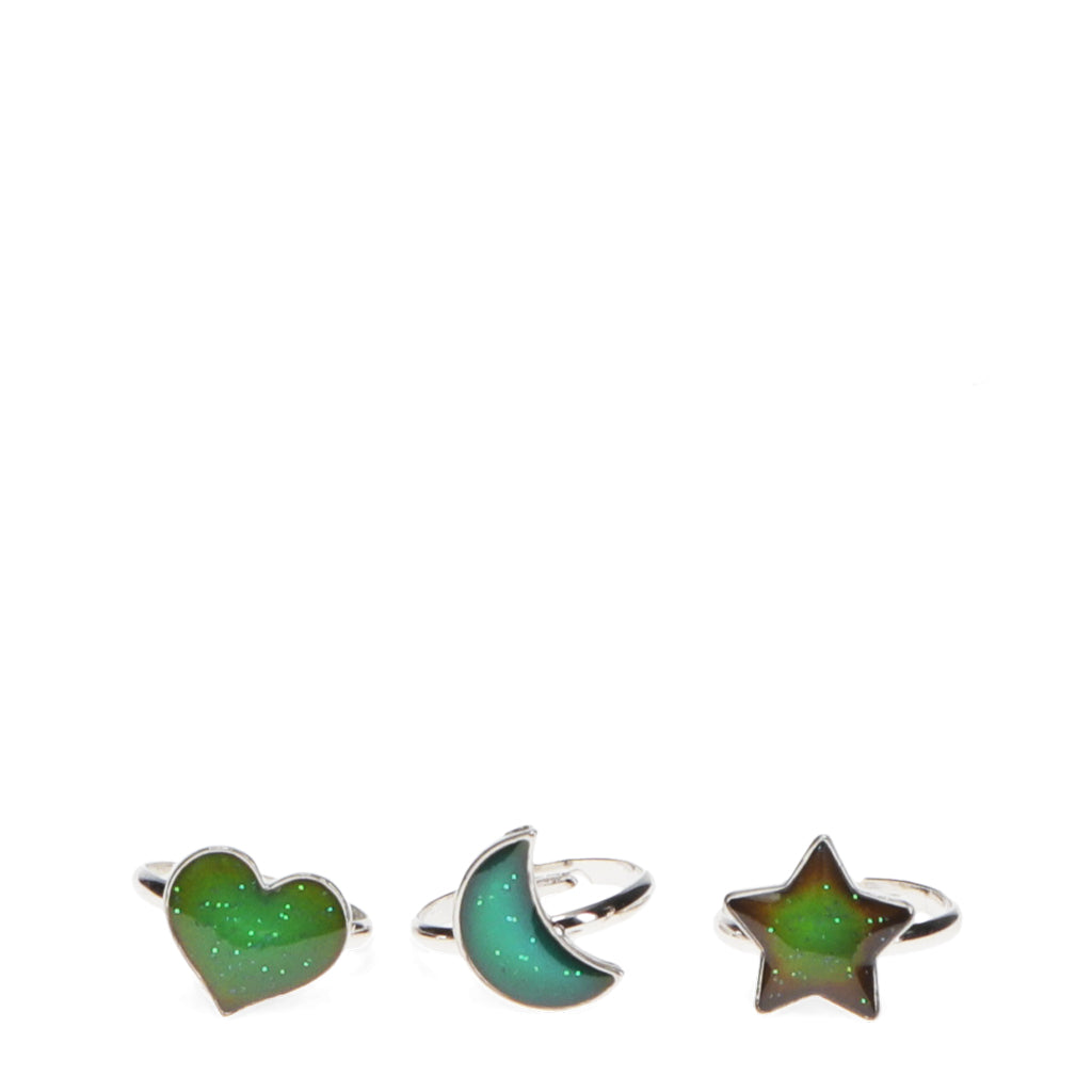 Three green gemstone rings shaped like a heart, moon, and star on a white background.