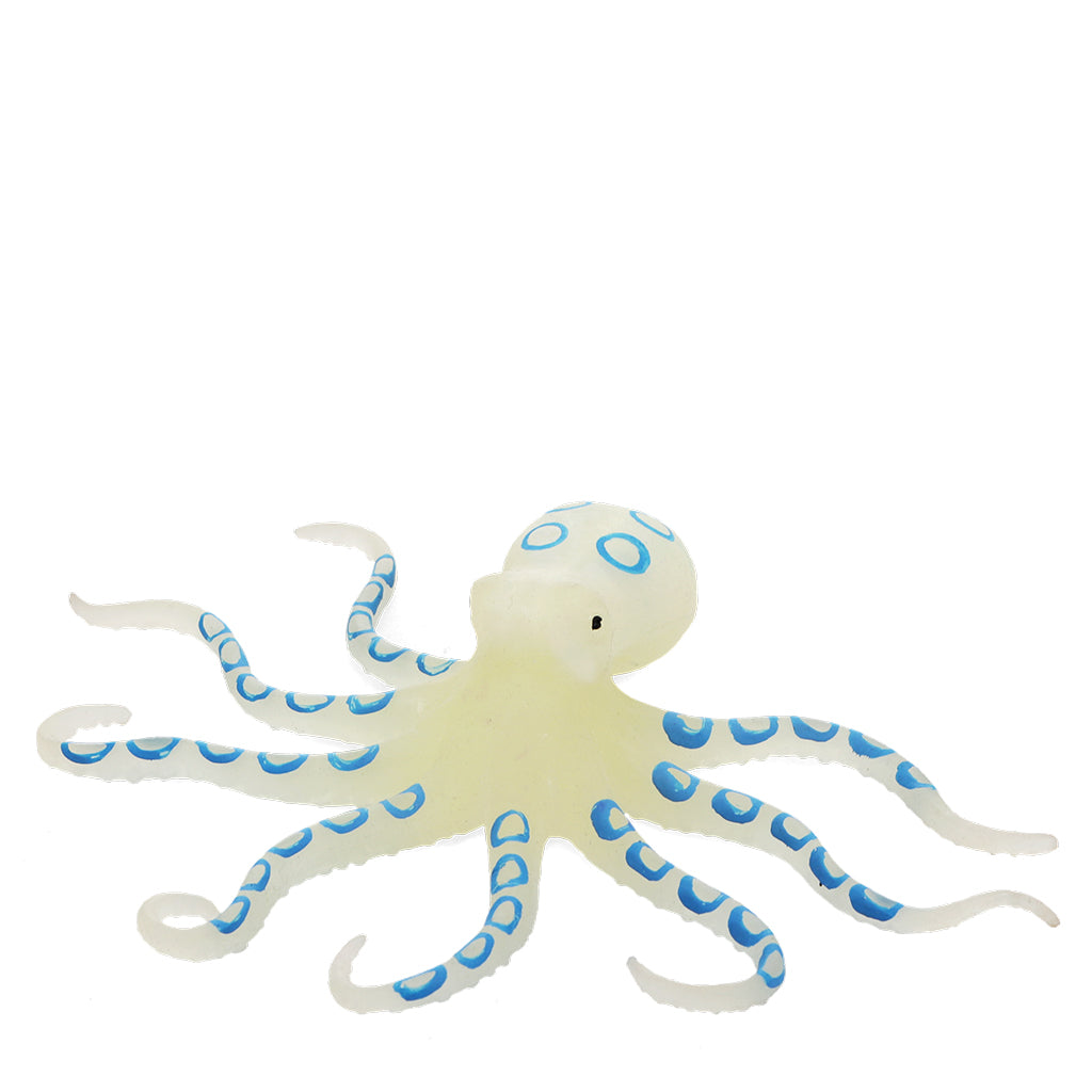 Transparent octopus toy with blue patterns on a white background