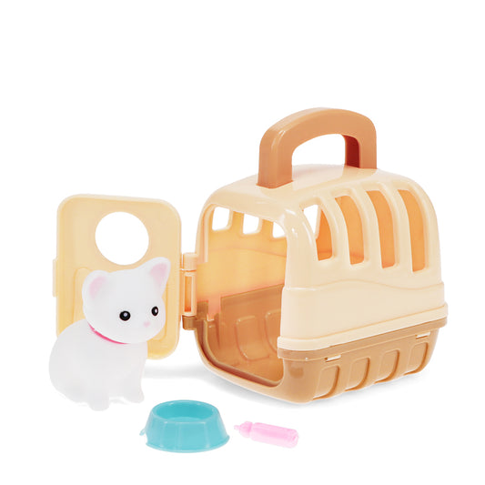 Toy pet carrier with a small white dog figure and accessories on a white background