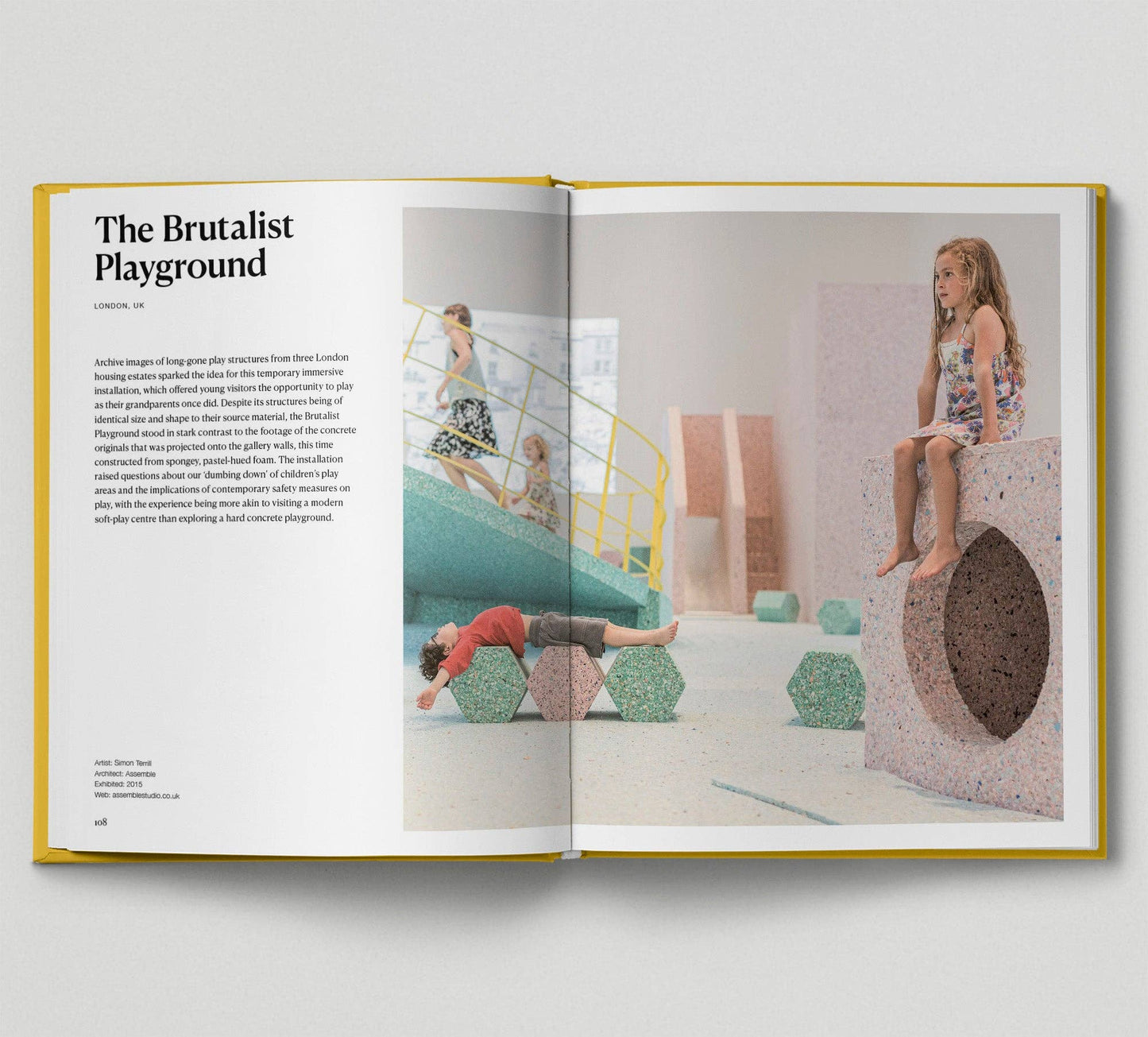 Open book showing a page titled 'The Brutalist Playground' with images of children playing on playground equipment.