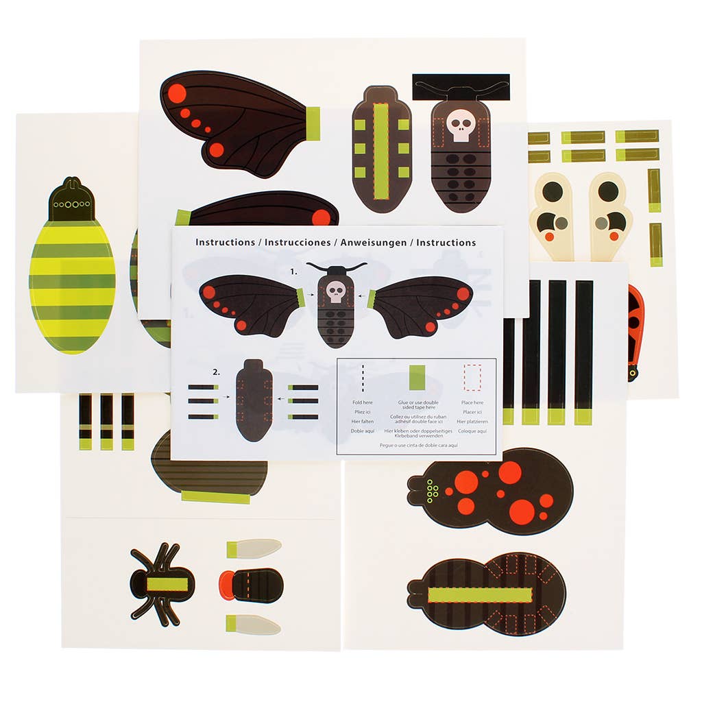 Children's craft kit with insect-themed pieces and instructions on a white background