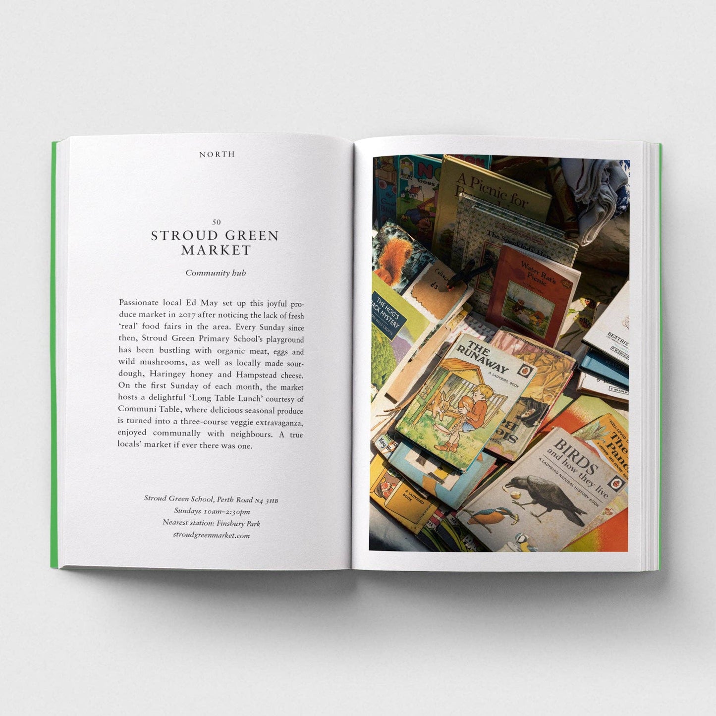 Open book showing text and a photo of Stroud Green Market