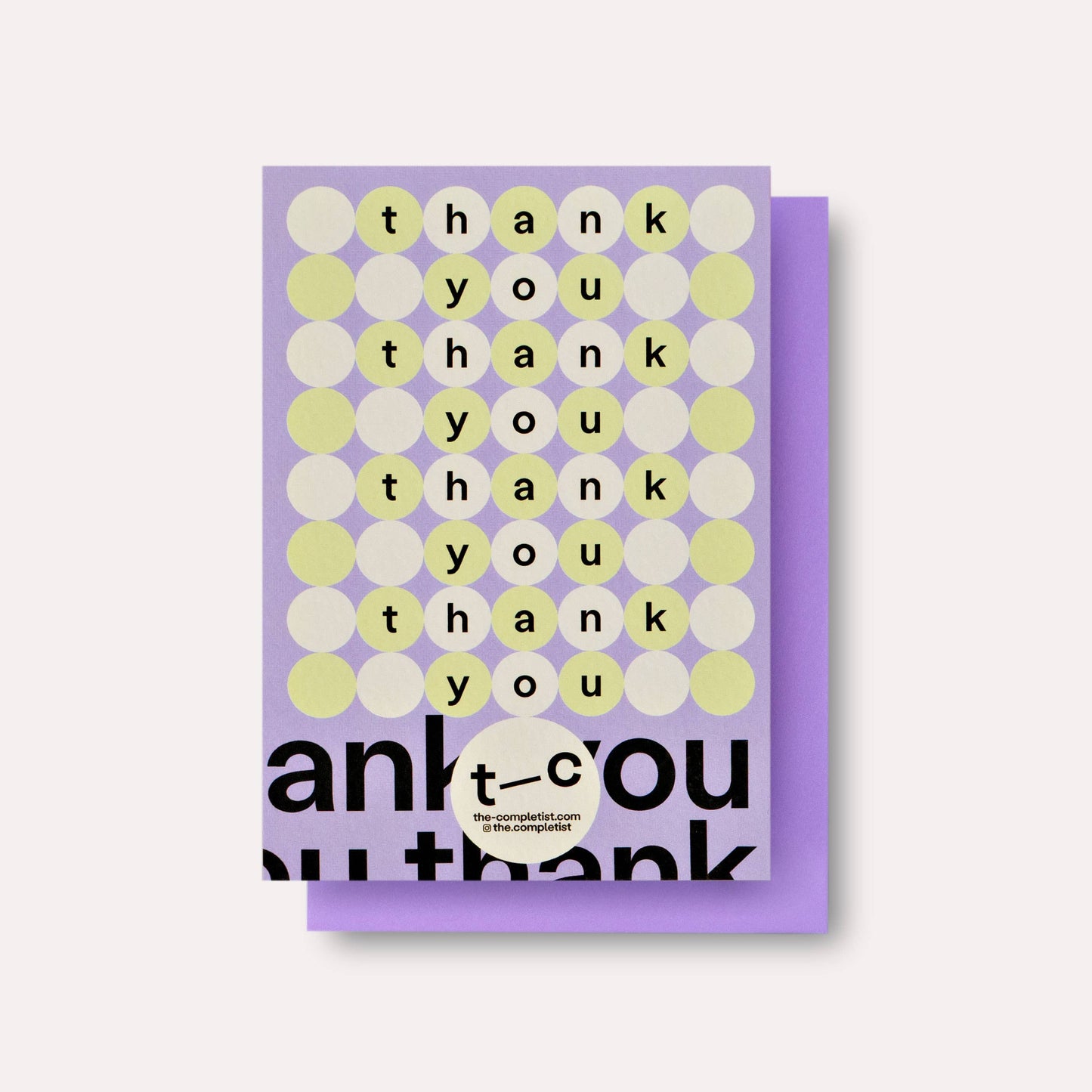 Greeting card with 'thank you' text in various colors on a purple background