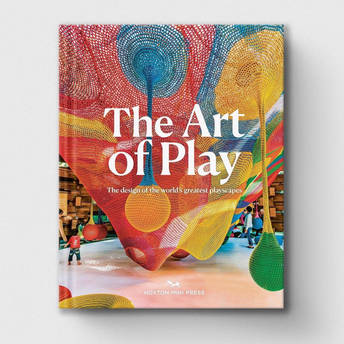 Book cover of 'The Art of Play' with colorful design and children playing in the background
