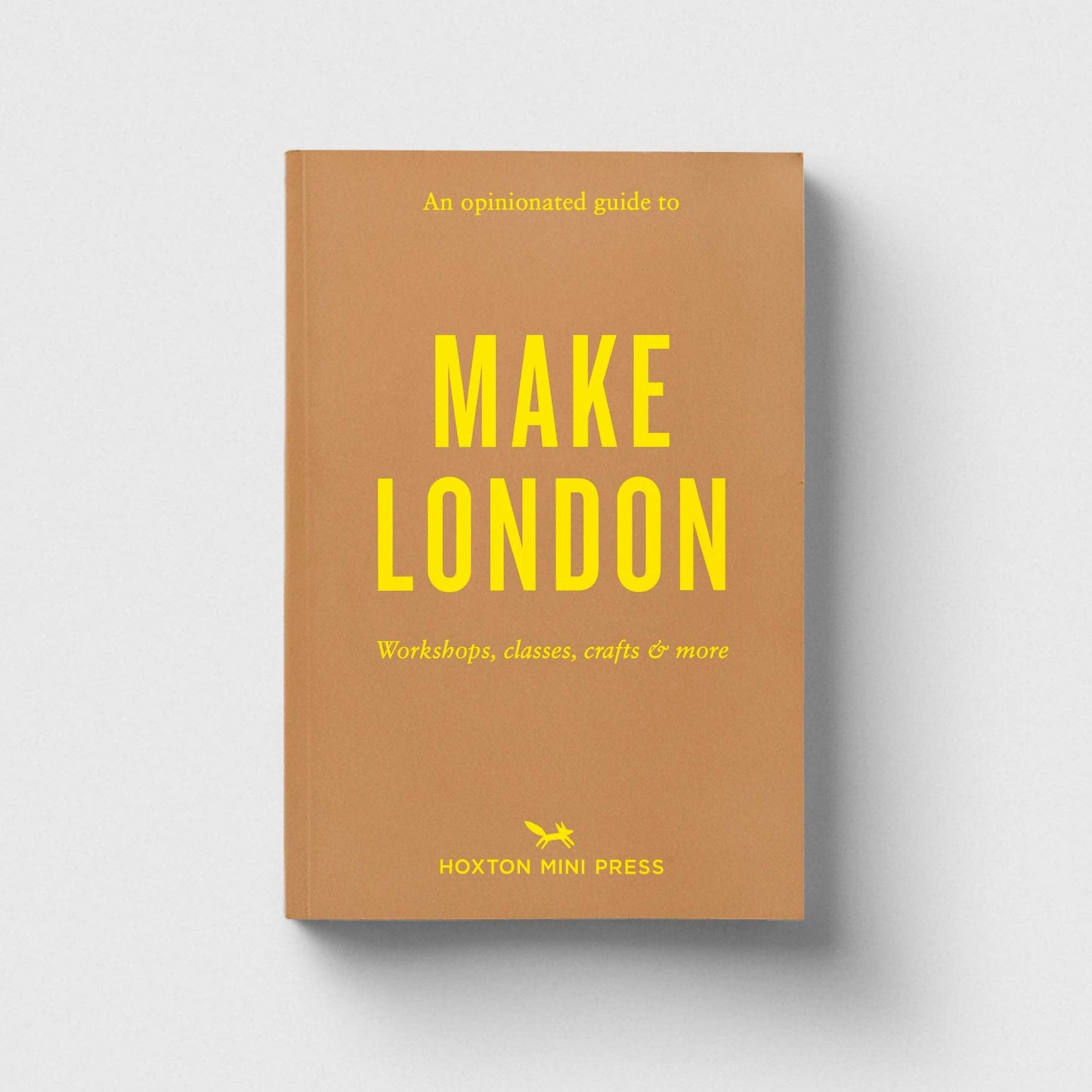 Book cover of 'Make London' with yellow text on a brown background