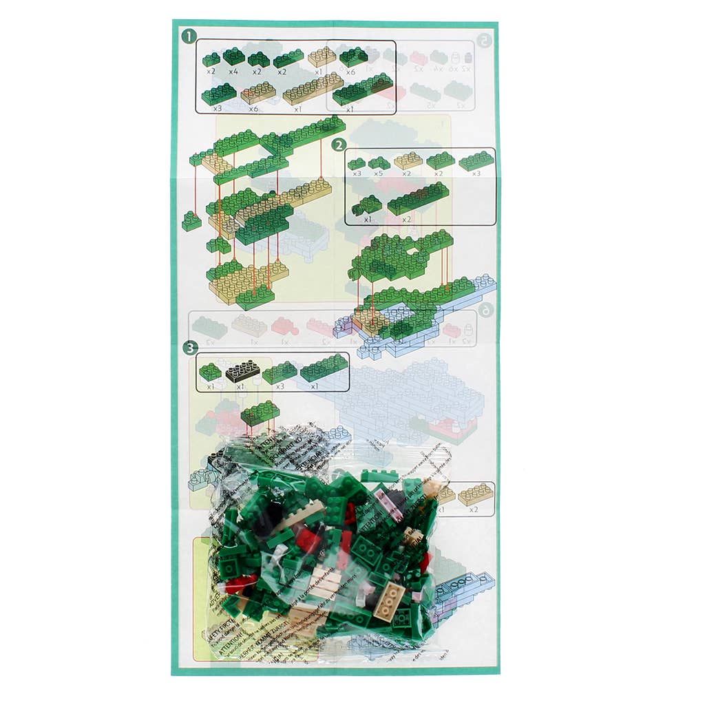 Model building kit with instructions and assembled model on a white background
