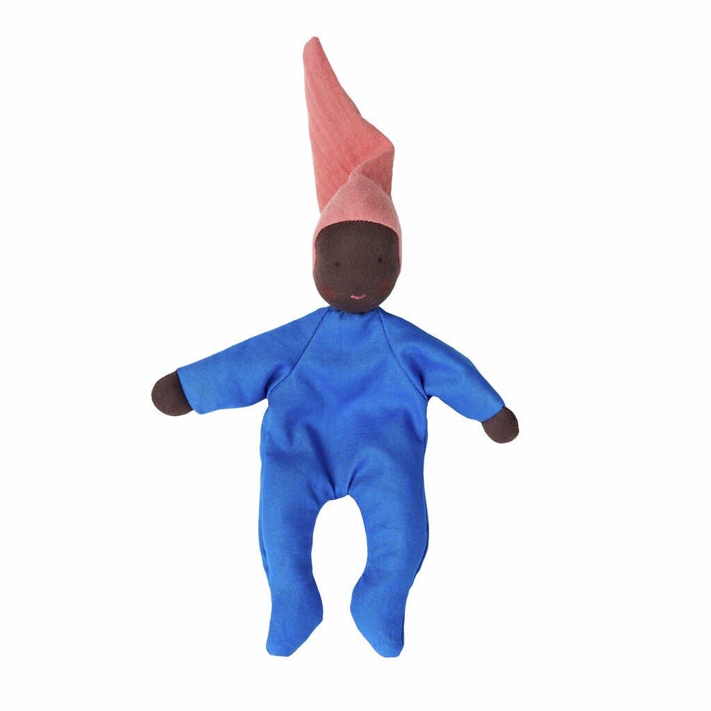 Baby doll with blue outfit and pink hat on a white background