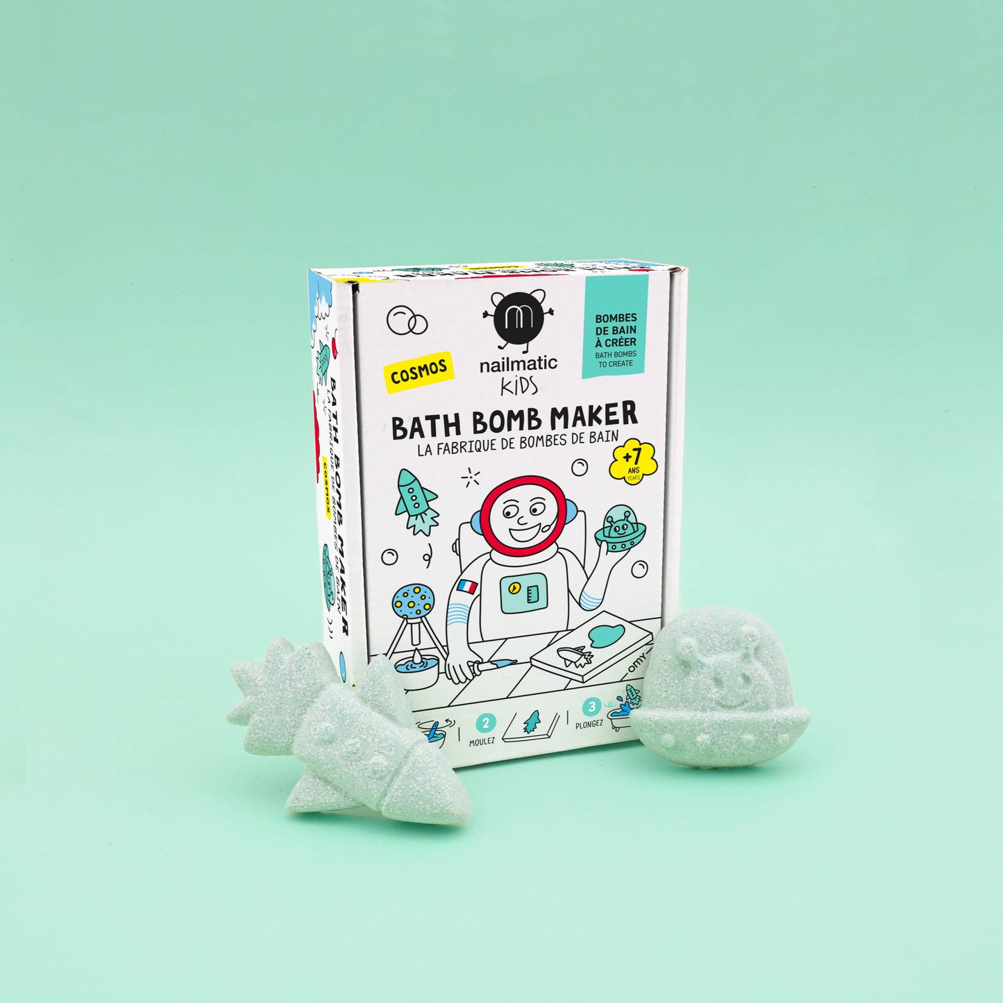 Bath bomb maker kit with bath bombs on a light green background