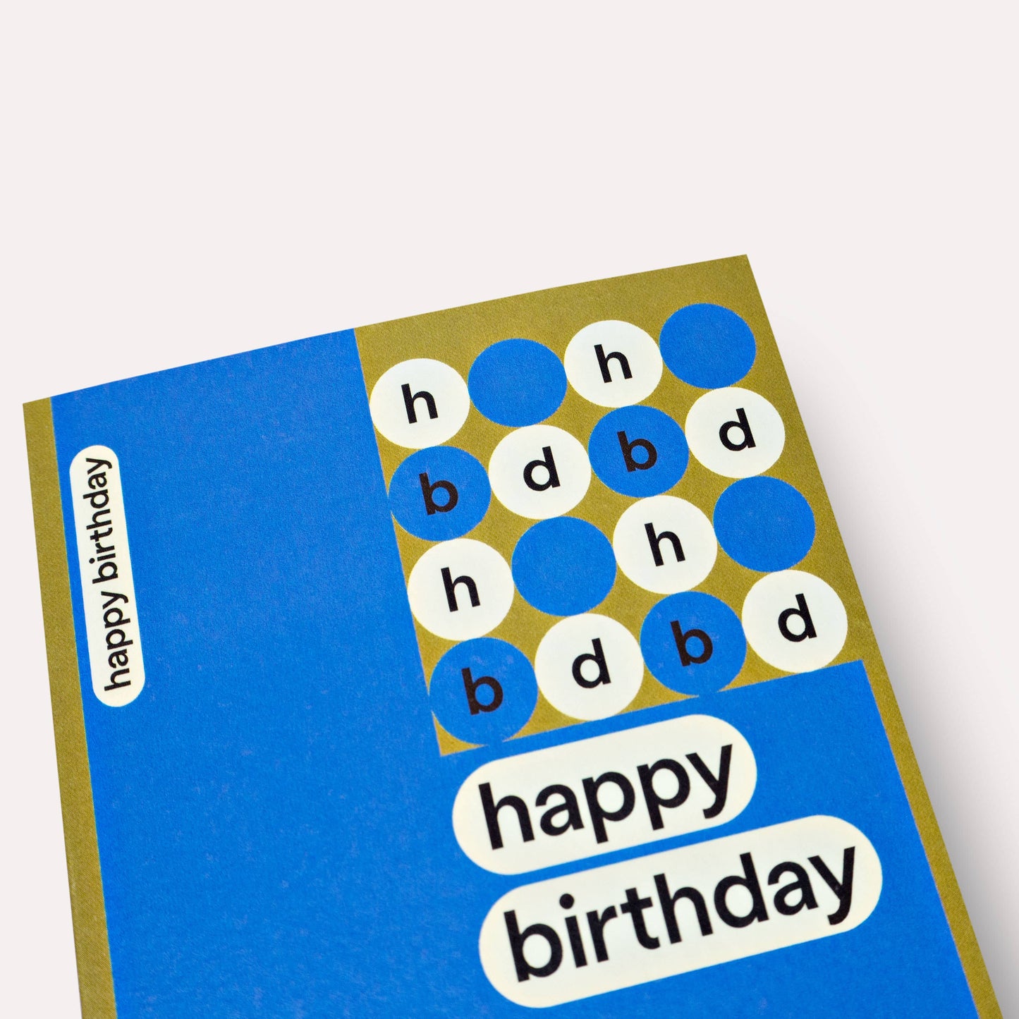 Blue birthday card with white and blue text and design elements on a white background