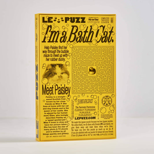 Yellow puzzle box with maze design and text on a white background