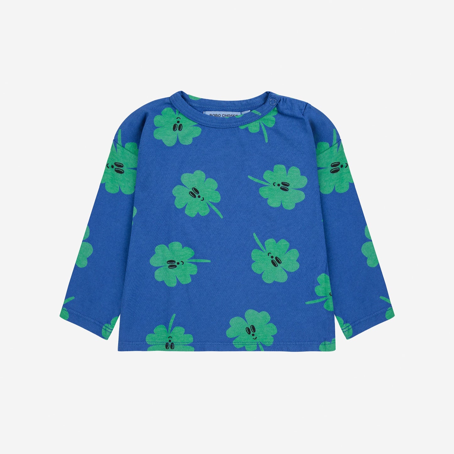 Blue long-sleeve shirt with green clover pattern on a white background