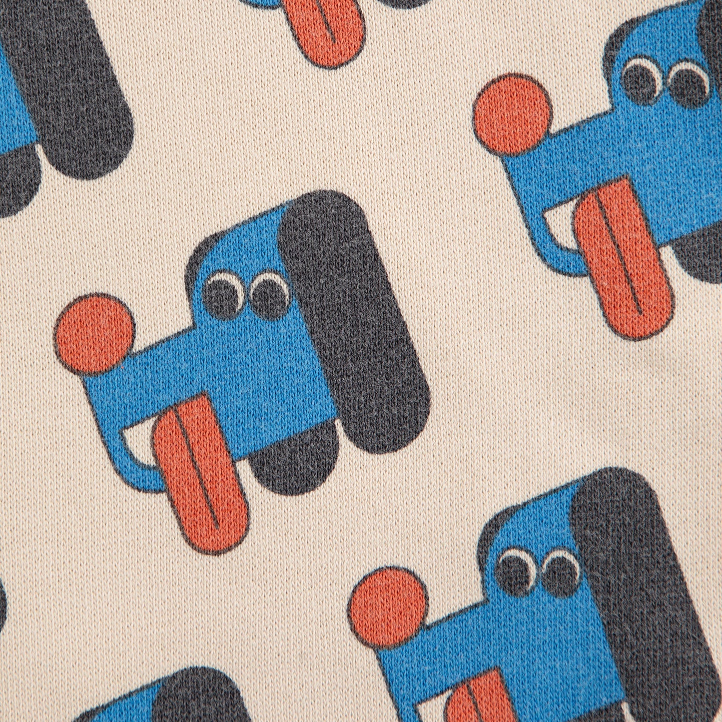 Pattern of blue dogs with red tongues on a beige background