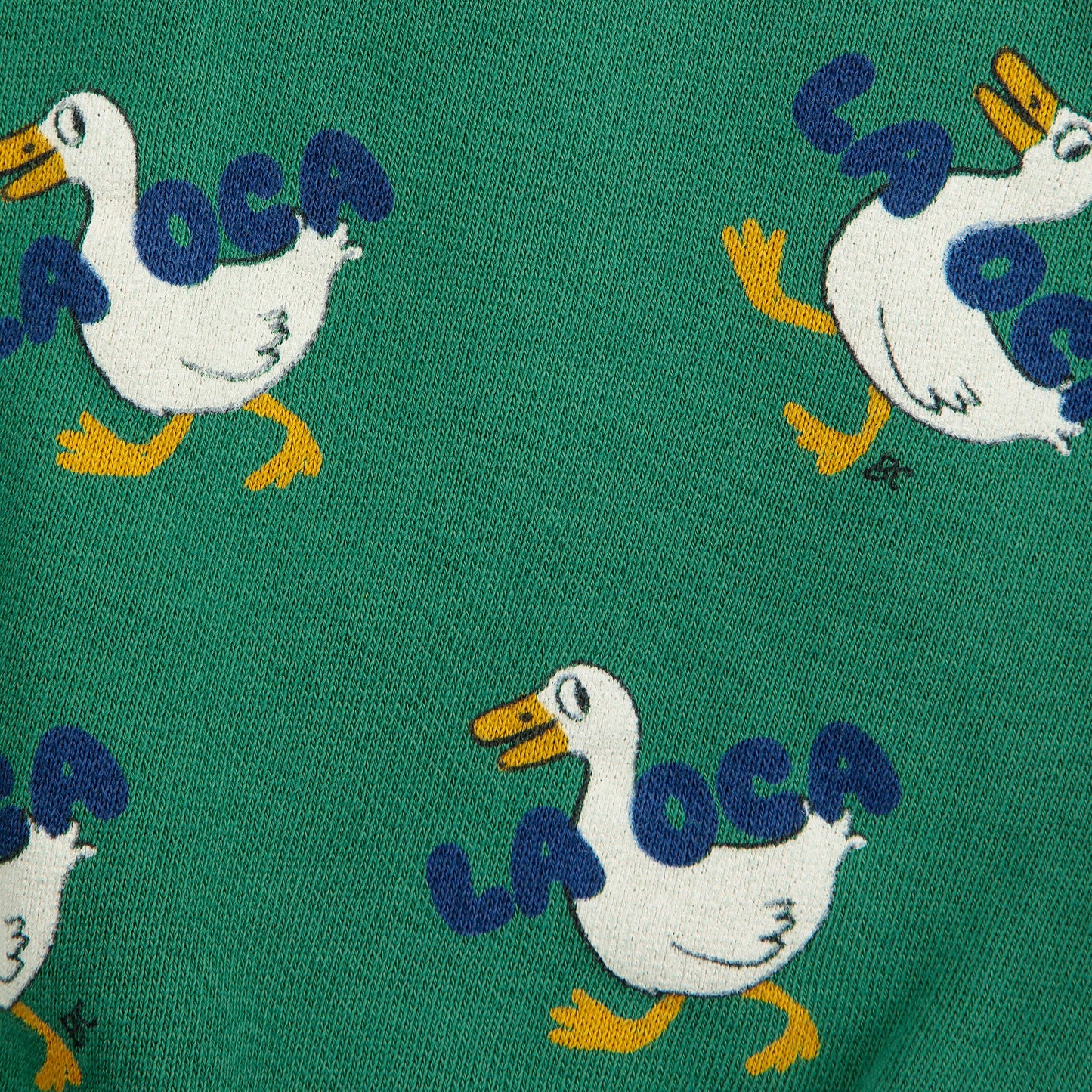 Pattern of cartoon ducks with 'Laoca' text on a green background