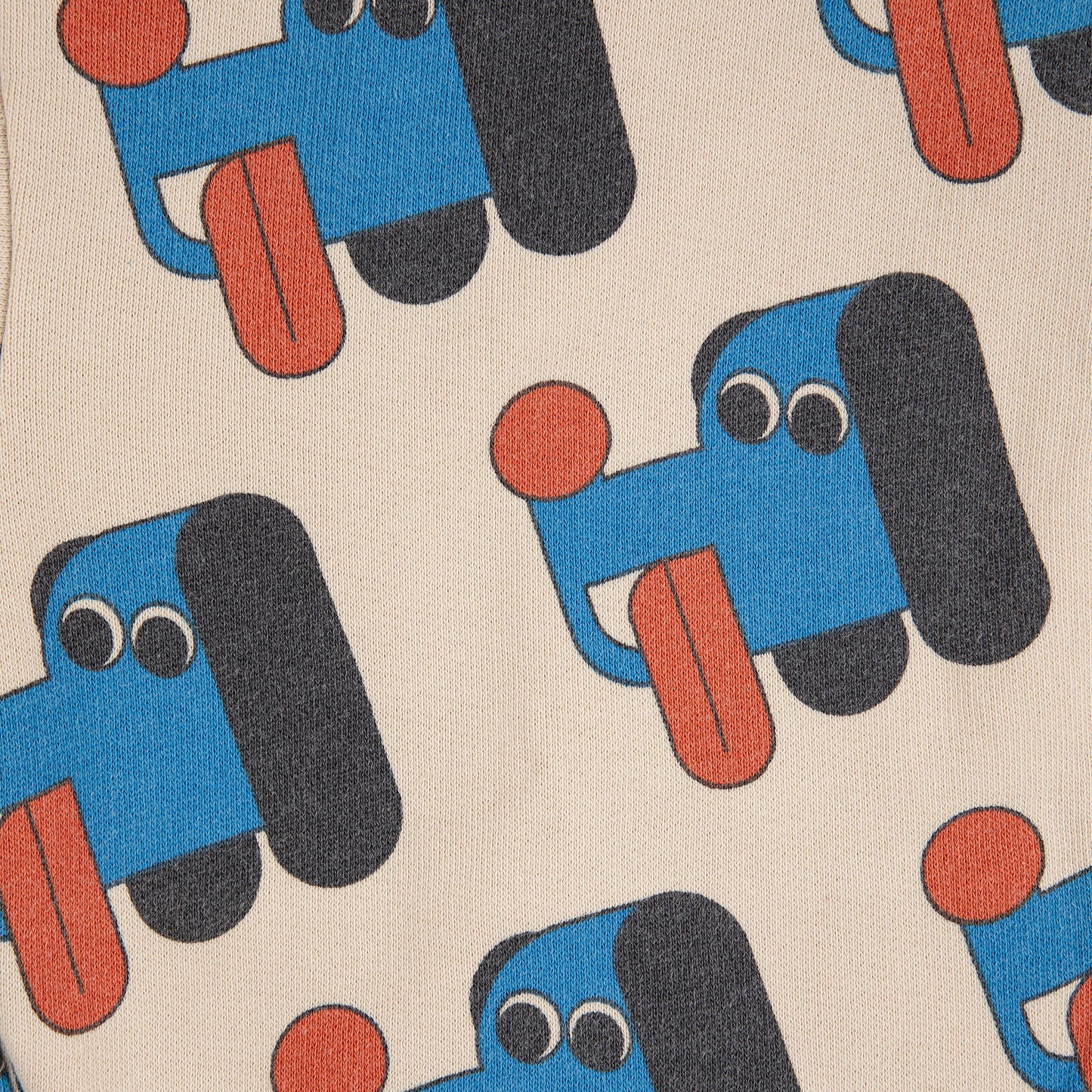 Pattern of blue dogs with red noses and black ears on a beige background