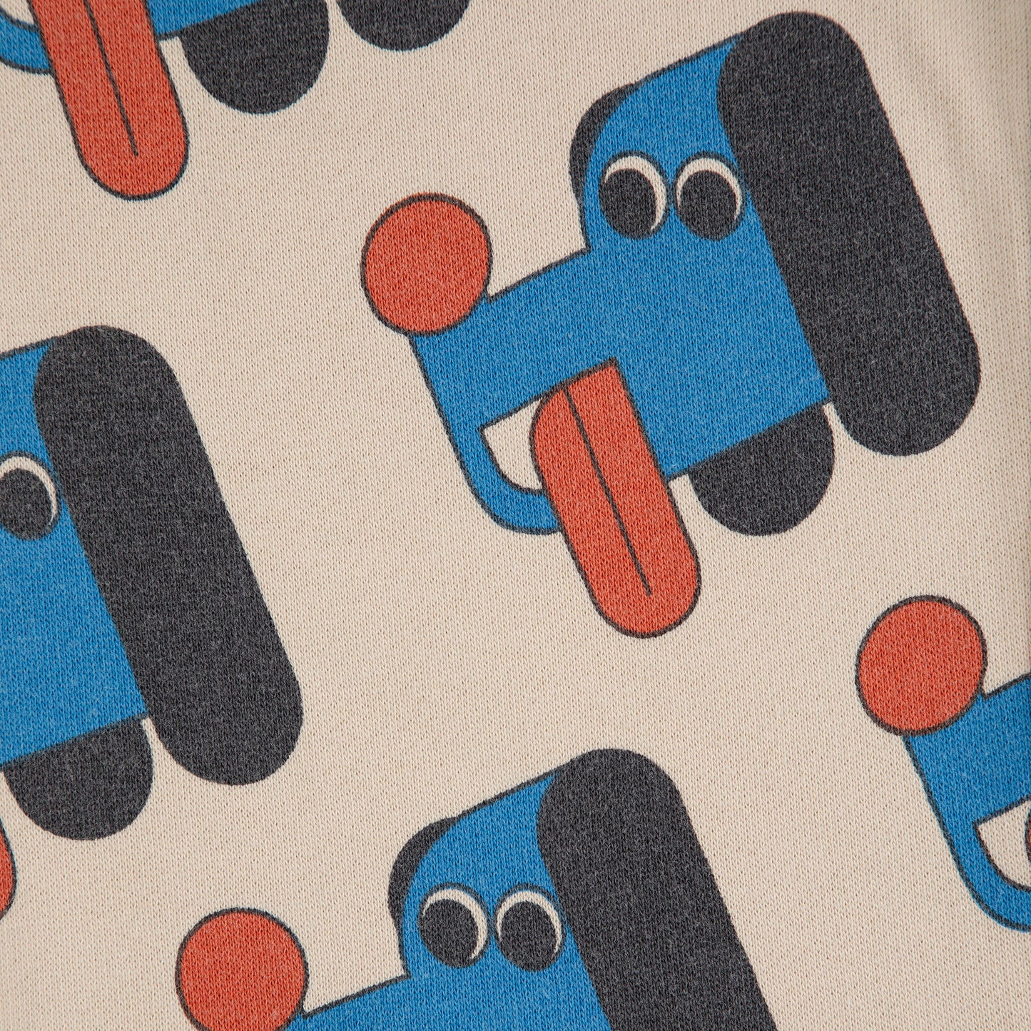 Pattern of blue dog faces with red noses on a beige background