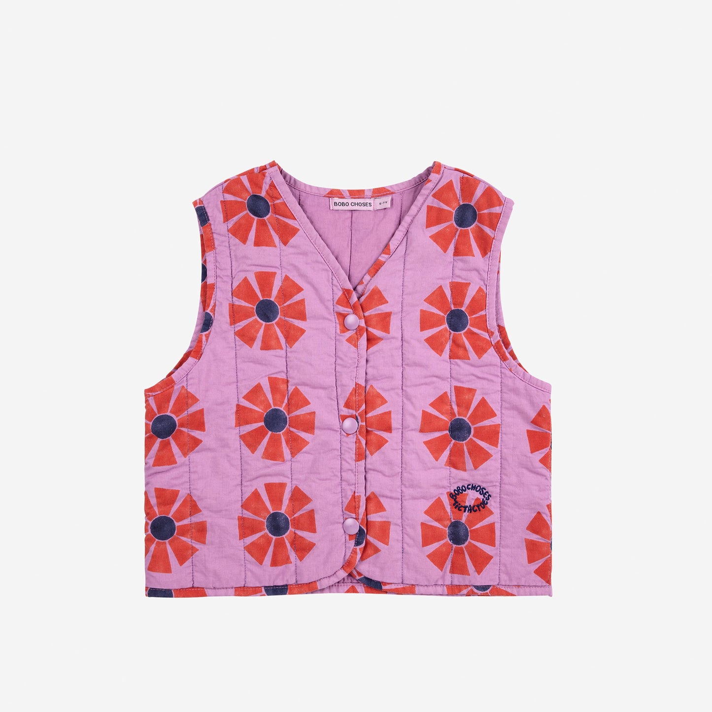 Pink vest with orange floral pattern on a white background