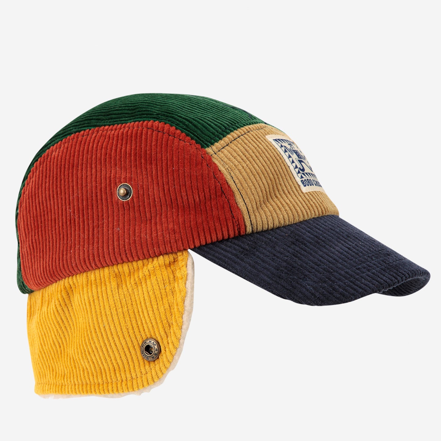 Colorful corduroy cap with a patch on a white background