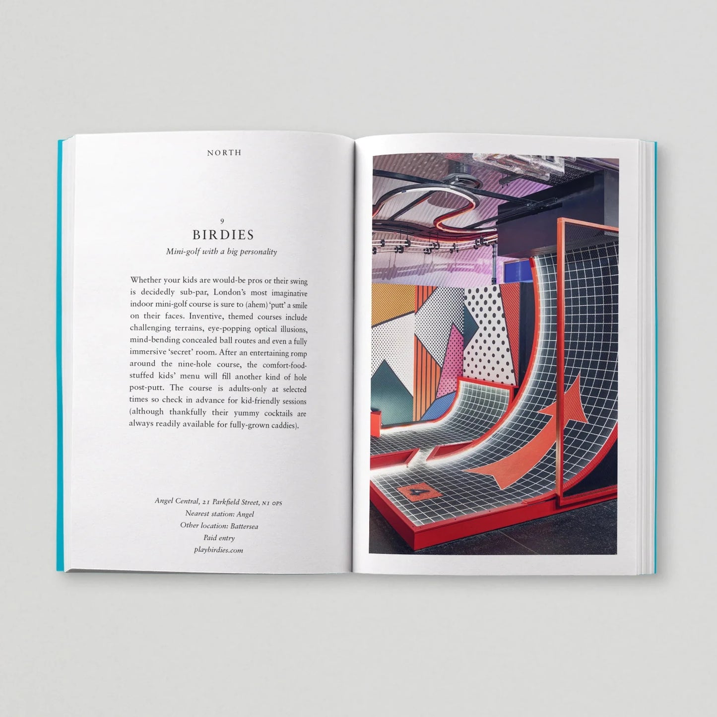 Open book with interior pages on a gray background