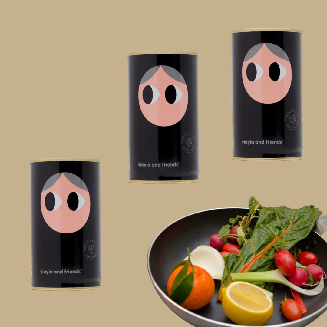 Three black cans with cartoon faces on a beige background, one can is shown open with a salad.