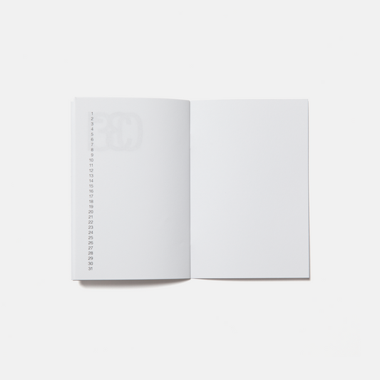 Open notebook with lined pages on a white background