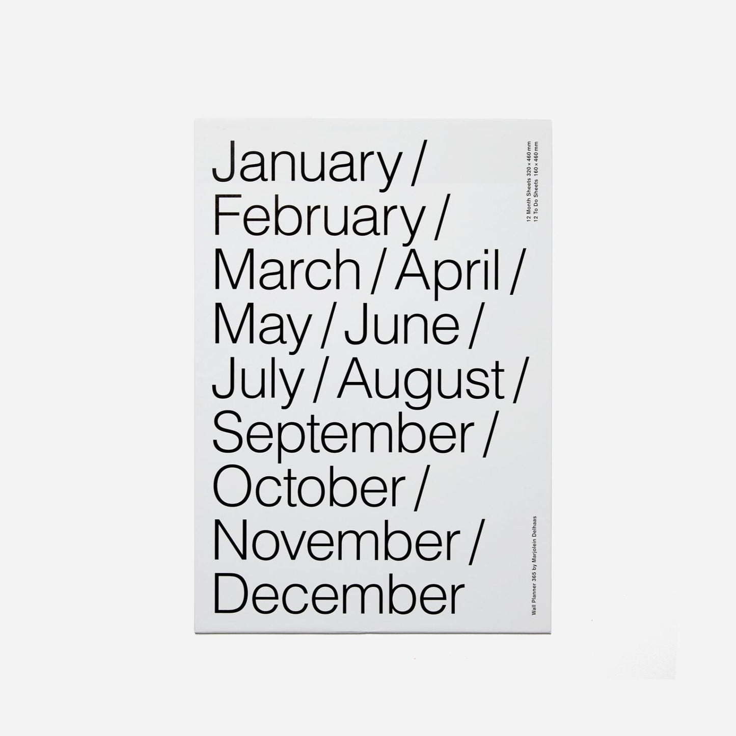 White poster with black text listing months of the year on a white background