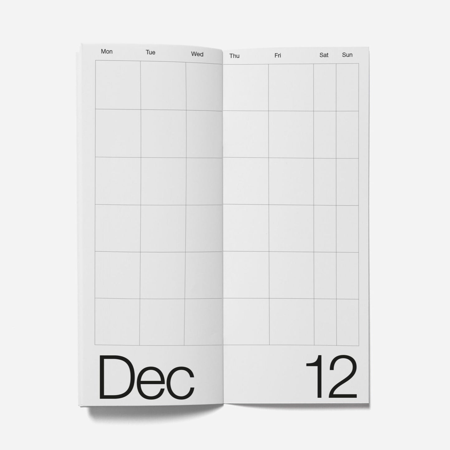 Two pages of a planner showing a month layout with grid lines on a white background.