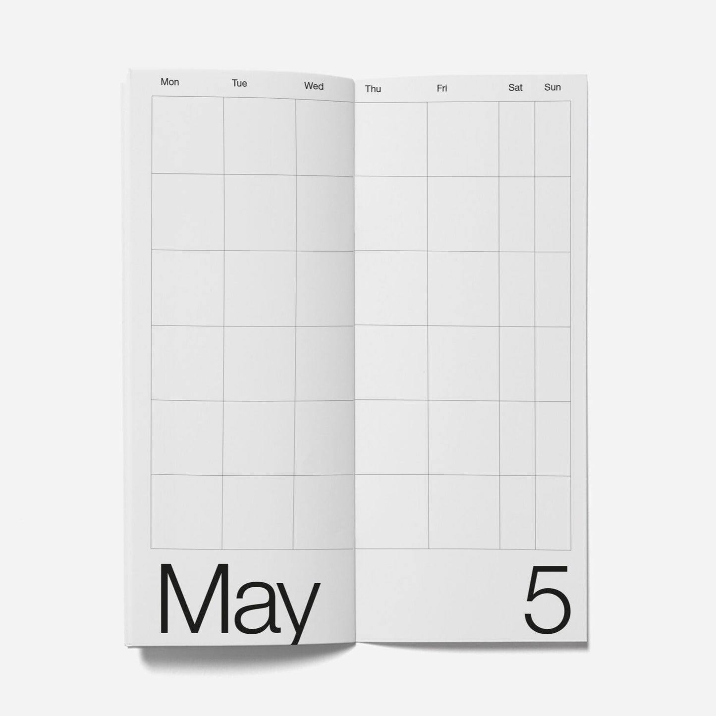 Two pages of a planner showing May 5th on a white background