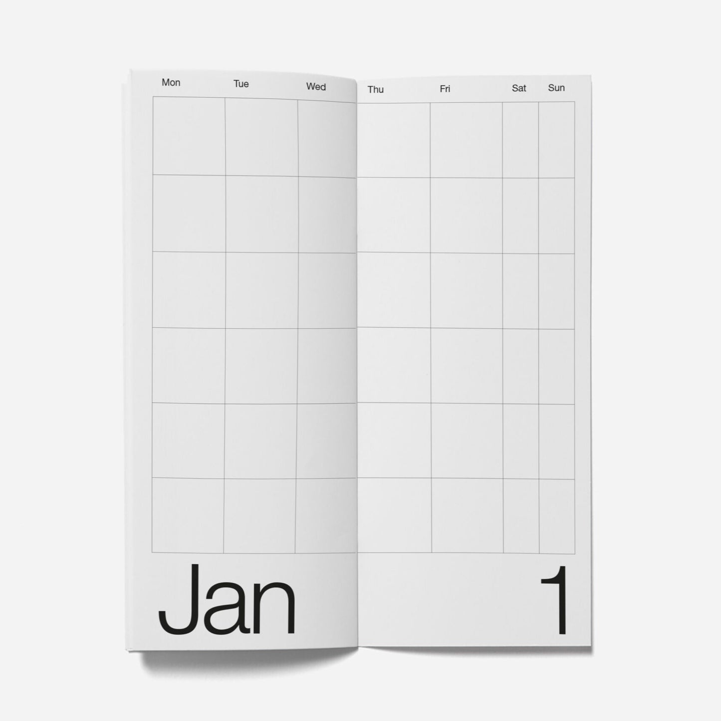 Two white calendar pages with grid layout on a light gray background