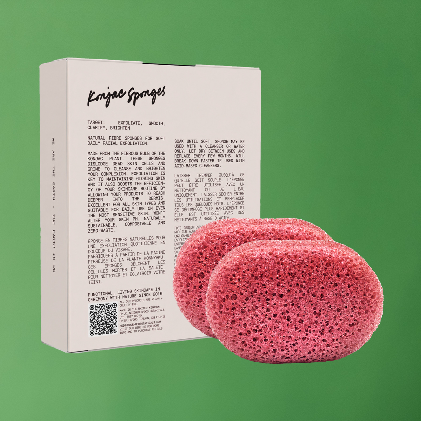 A set of pink/red natural fibre konjac sponges in a white box with black writing, showcasing their sustainable packaging.