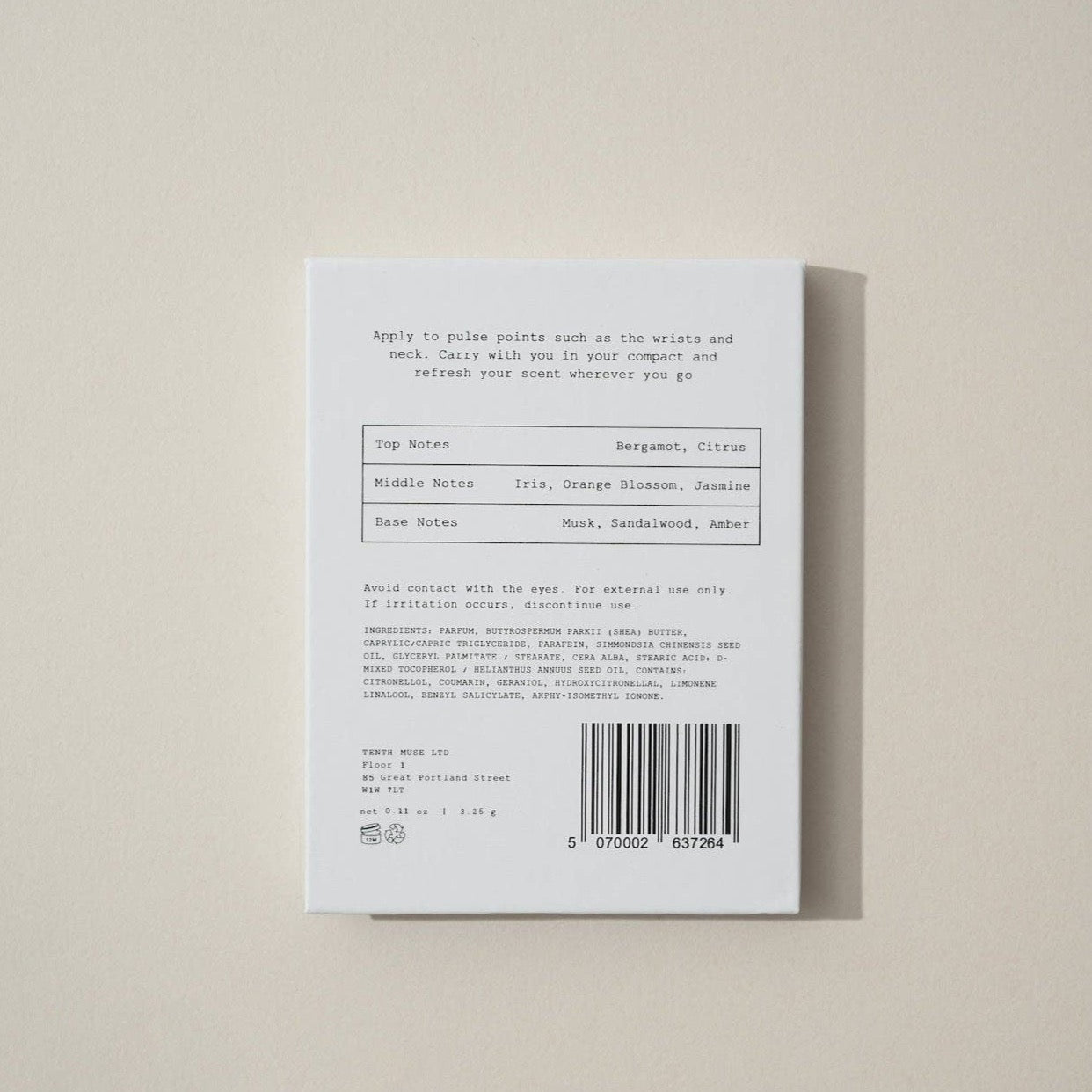 The back of the solid perfume balm that says how and where to apply the perfume, the top notes, middle notes and base notes of the scent and the ingredients of the balm.