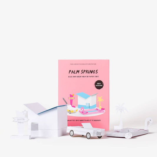 Pink book titled 'Palm Springs' with a car illustration on a white background