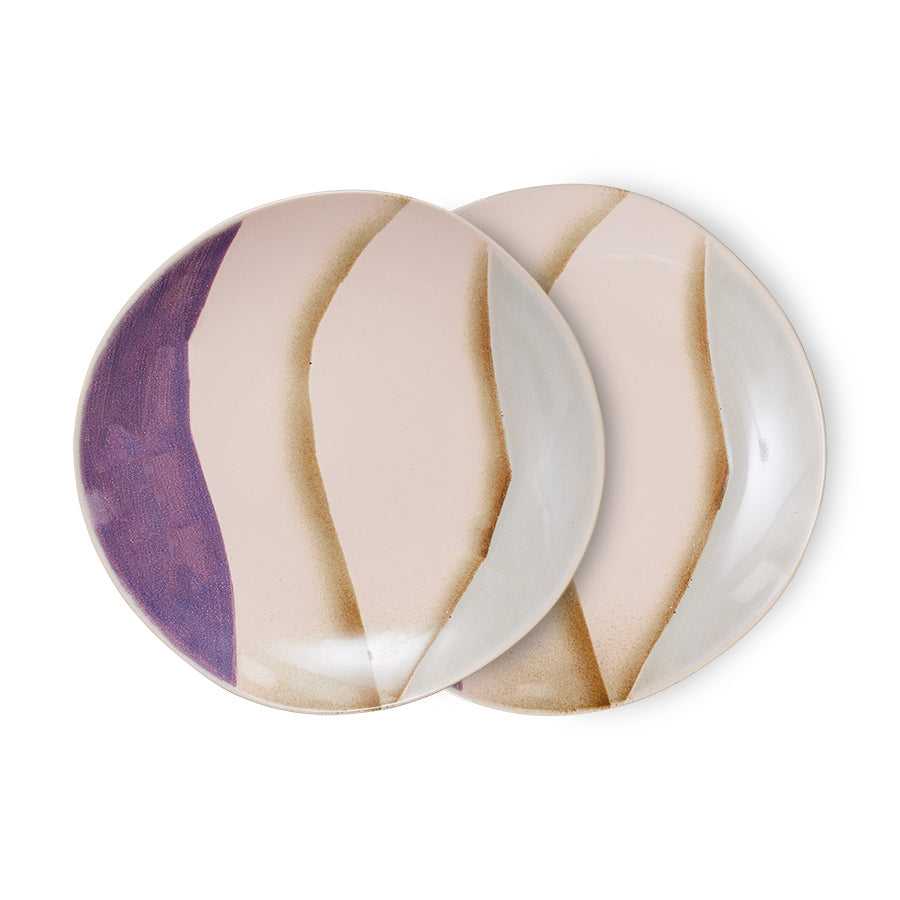 Pair of round earrings with a gradient design on a white background