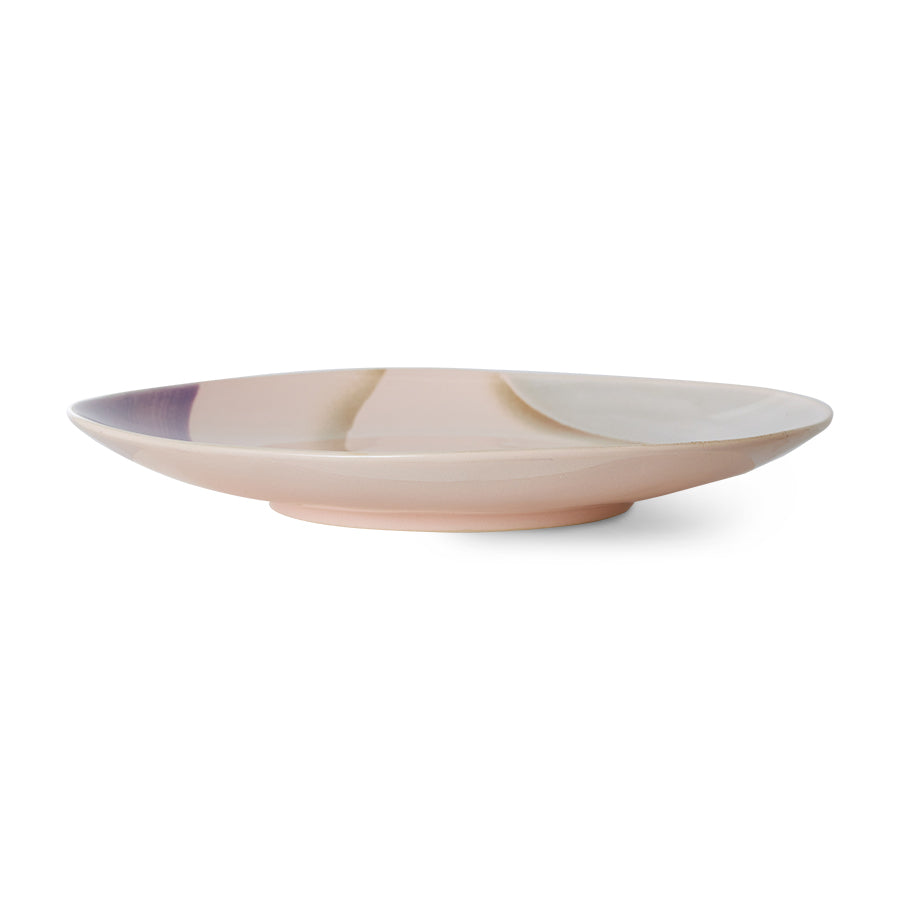 Ceramic plate with a gradient design on a white background