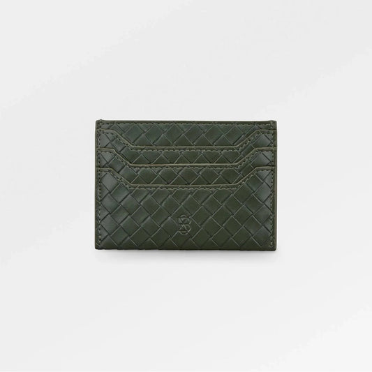 Green quilted cardholder on a white background