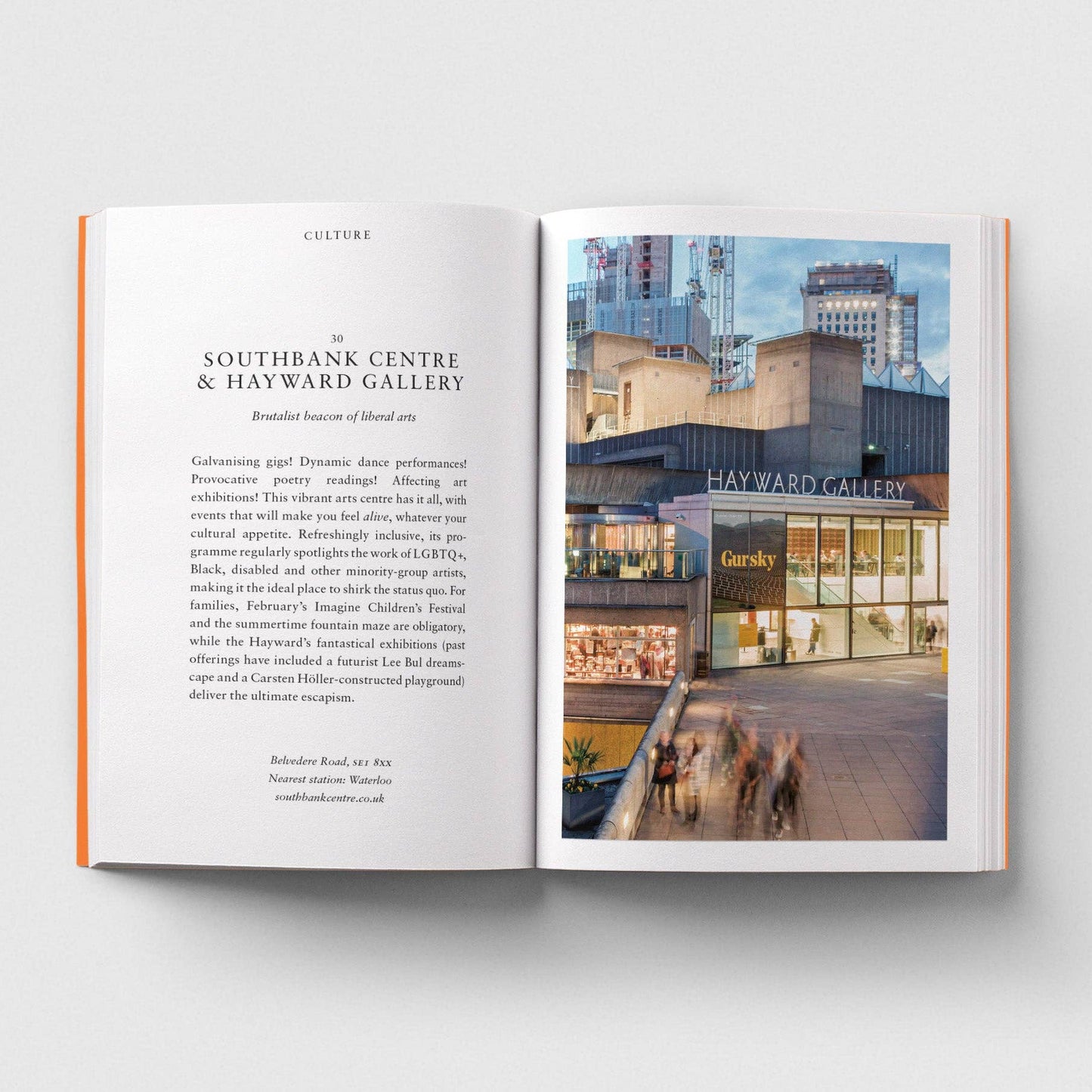 Open book showing text and an image of a building with 'Hayward Gallery' on the cover.