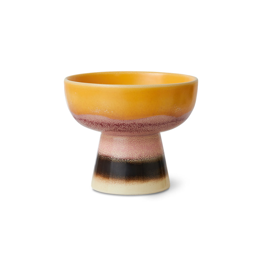 Ceramic bowl with multicolored design on a white background
