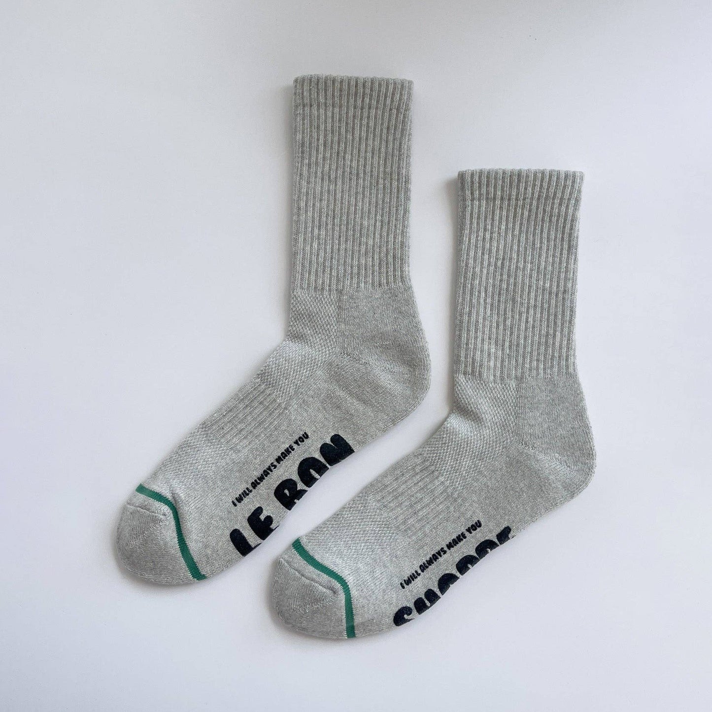 Gray socks with text on a white background